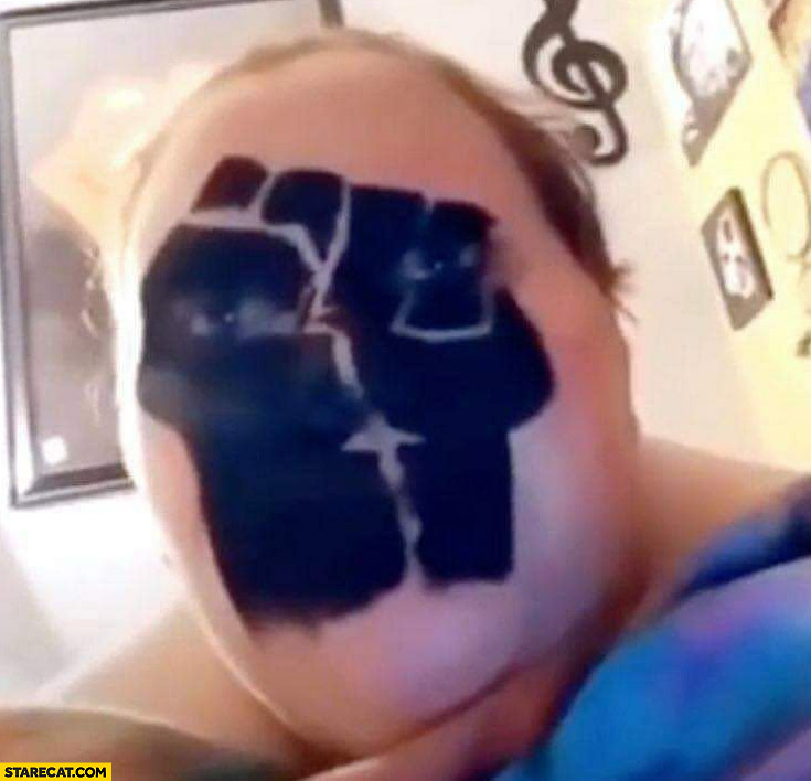 Black lives matter logo painted on a face fail