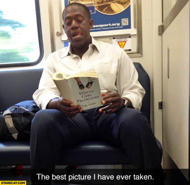 Black man reading white girl problems book while commuting best picture I have ever taken