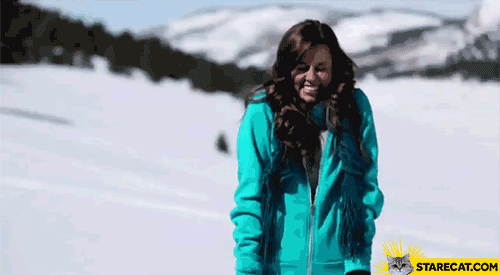 Girl hit by many snowballs GIF animation