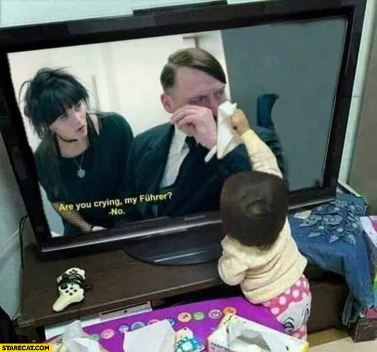 Hitler crying movie scene baby with a tissue to cheer him up