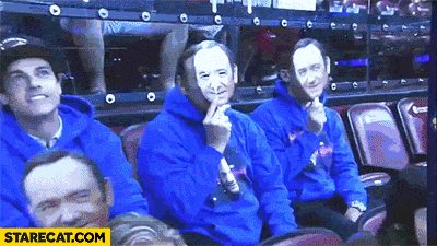 Kevin Spacey wearing a mask with his own face gif animation