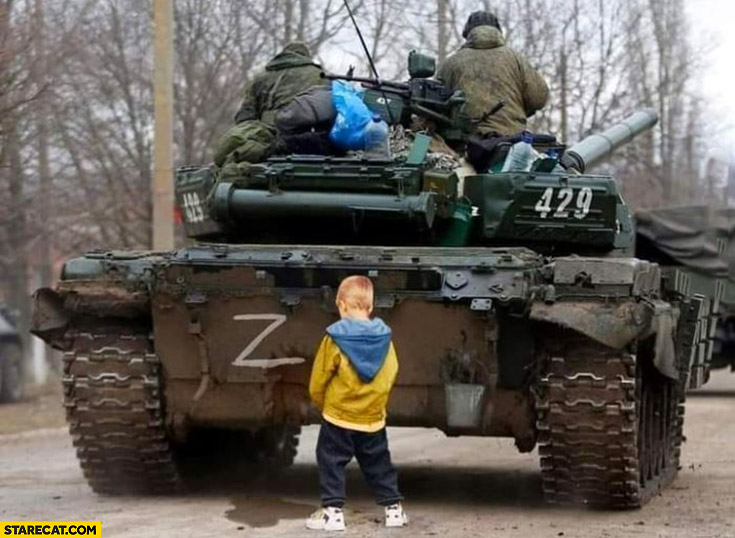 Kid boy peeing at russian tank with Z symbol