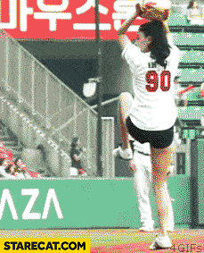 Korean girl throwing baseball