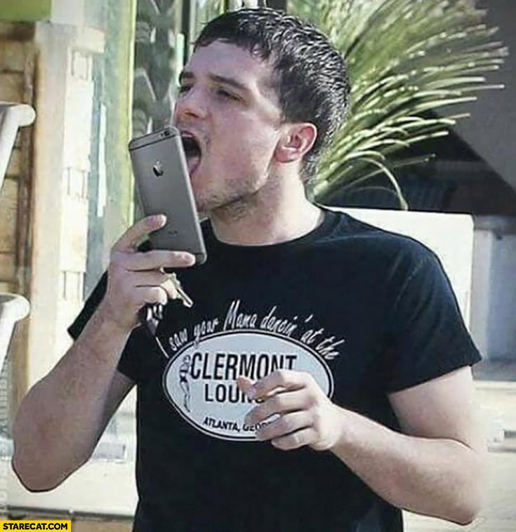 Man licking his phone cellphone smartphone