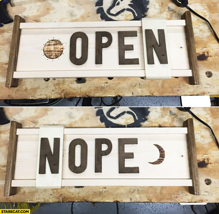 Open / Nope creative sign with sliding letter “N”