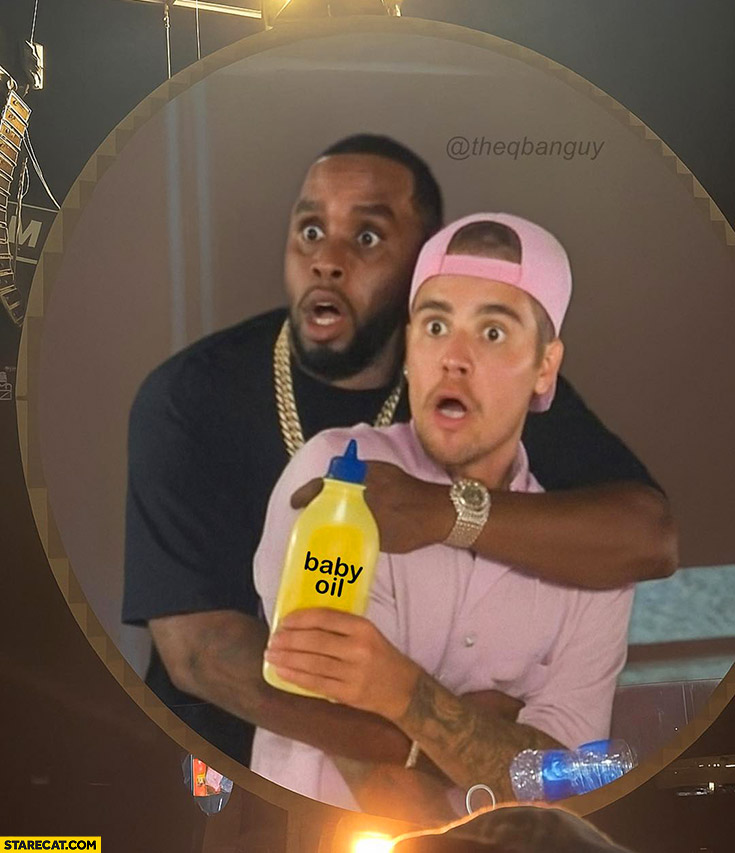 P Diddy with Justin Biber with baby oil hugging at Coldplay concert