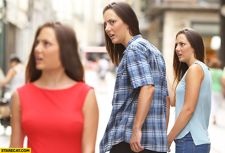Photothopped meme guy looking at a girl in red dress his girlfriend not happy about it