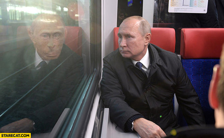 Putin window reflection monkey primitive man