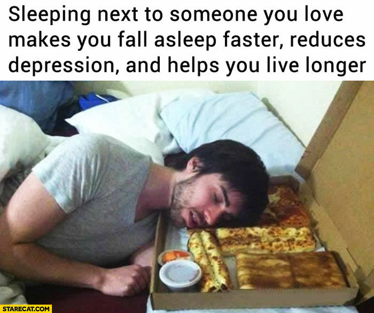 Sleeping next to someone you love makes you fall asleep faster reduces depression and helps you live longer man sleeping on a pizza