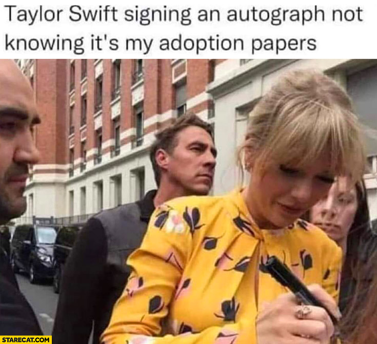 Taylor Swift signing an autograph not knowing it’s my adoption papers