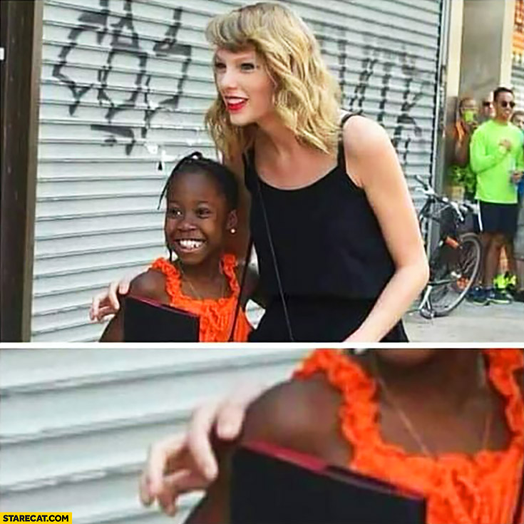 Taylor Swift with a black girl trying not to touch her