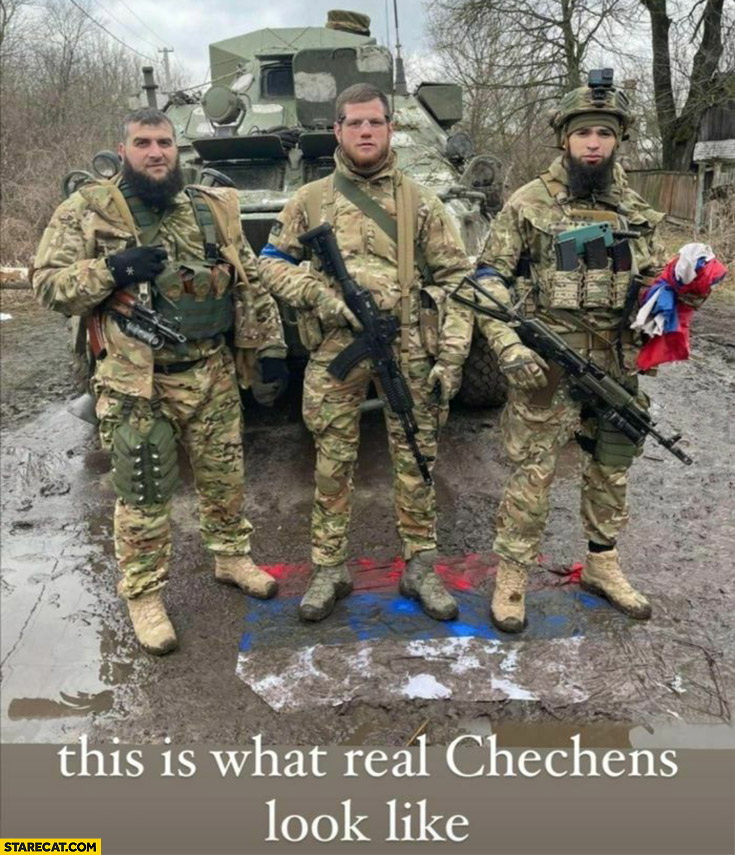 This is what real Chechens look like fighting for Ukraine standing on Russian flag