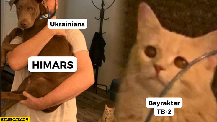Ukrainians hugging dog himars cat Bayraktar sad